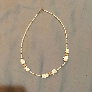 Shell necklace with gold accents